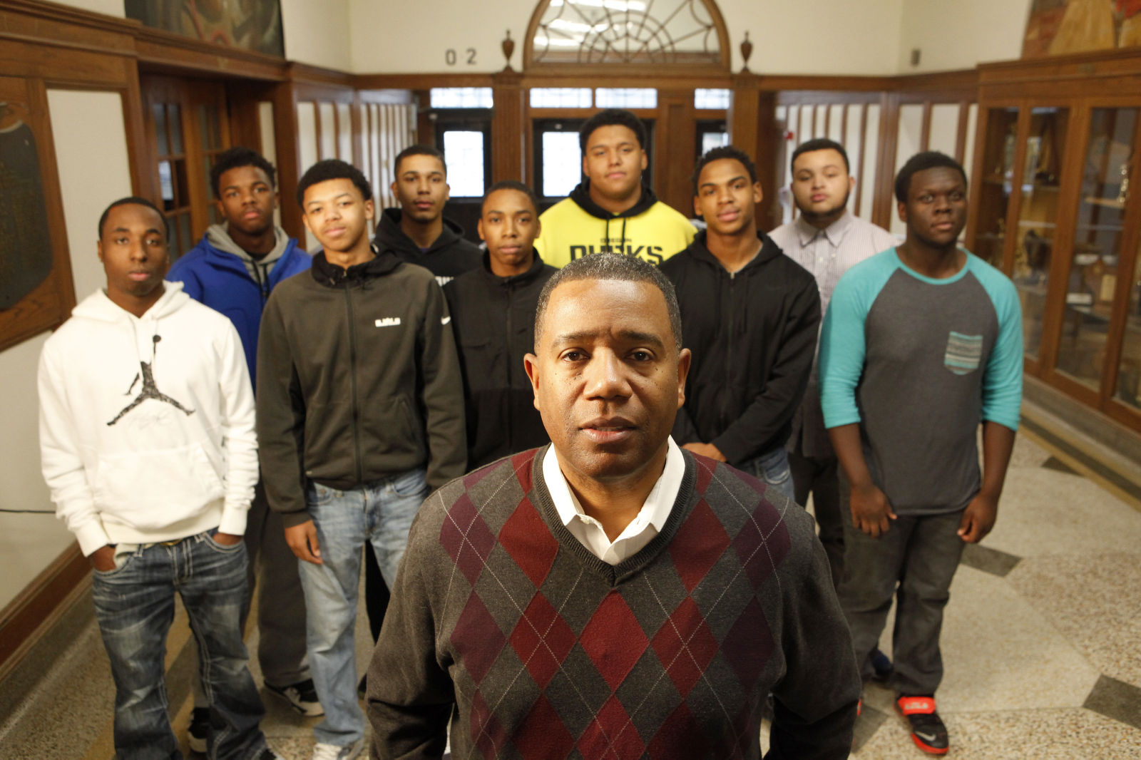 Alex Gee with West High students